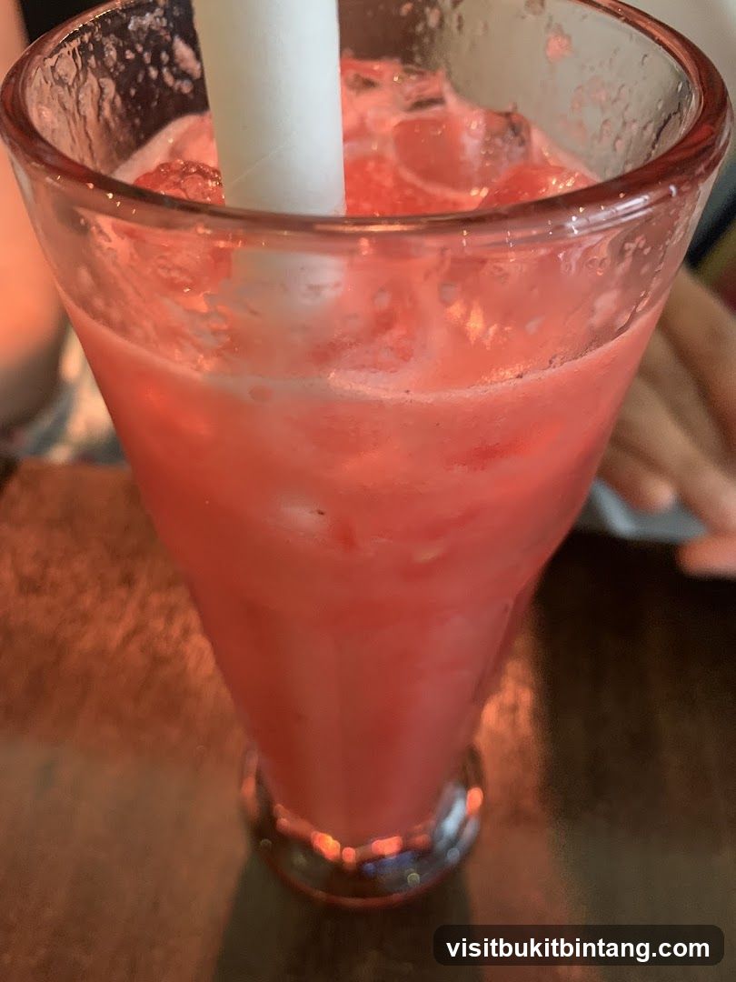 Pink Drink with Ice and Straw