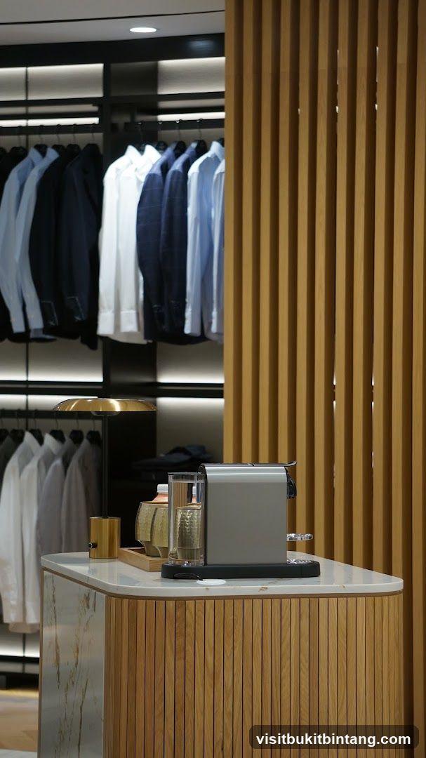 Modern Clothing Display with Coffee Station