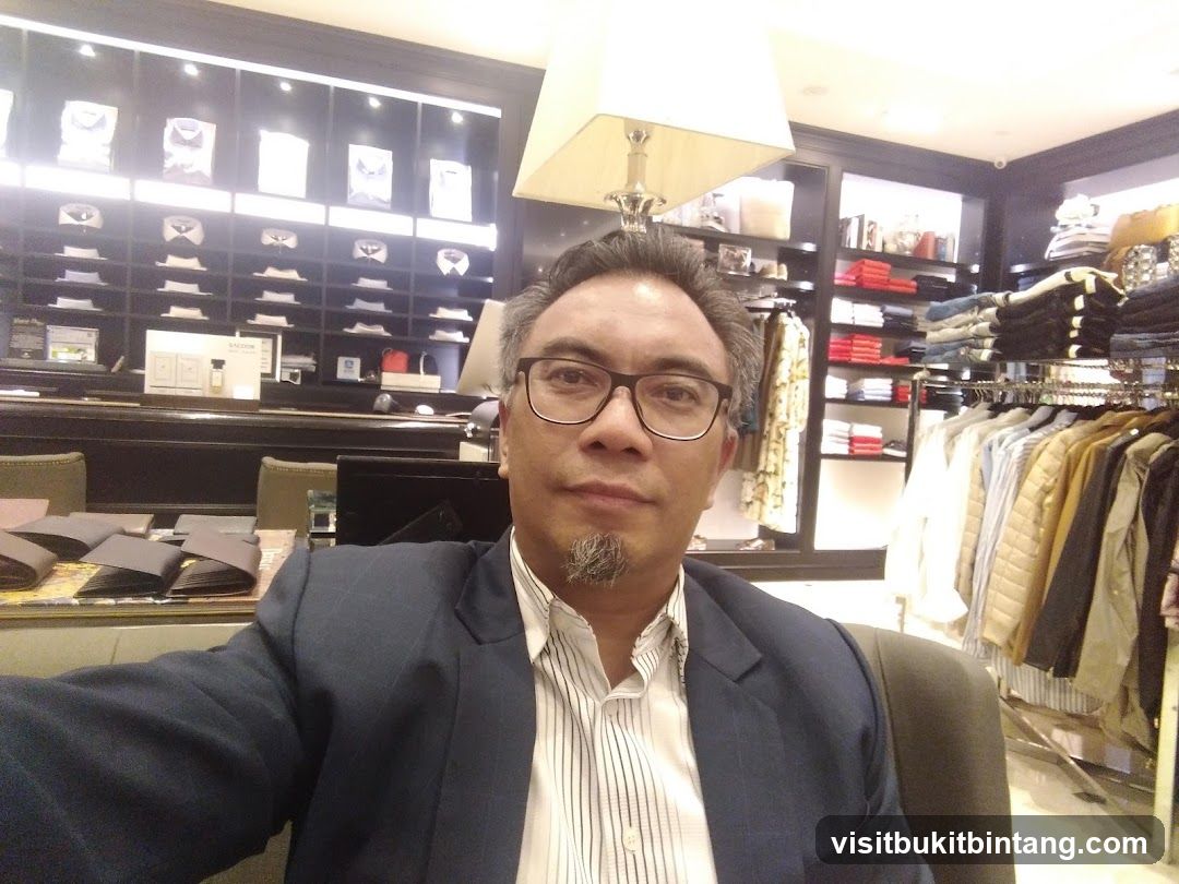 Man in a Suit in a Clothing Store