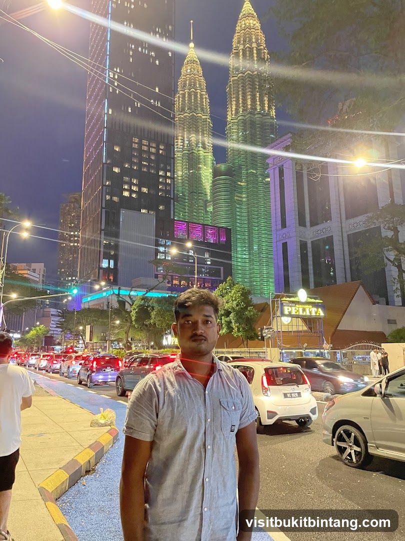 Man in front of Petronas Towers