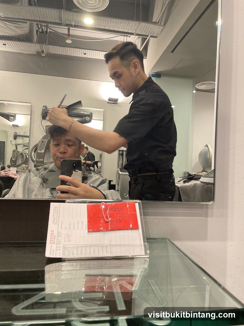 Hairdresser cutting client's hair