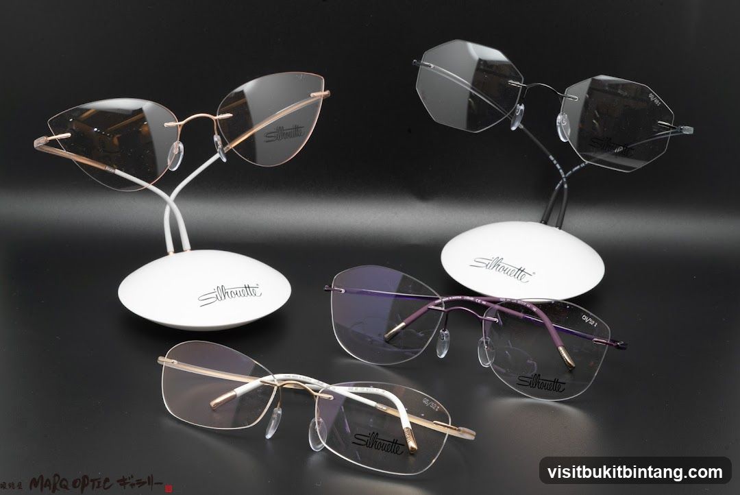 Four pairs of rimless Silhouette eyeglasses