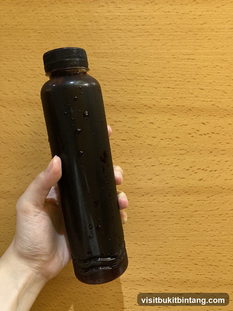 Bottle of Dark Liquid