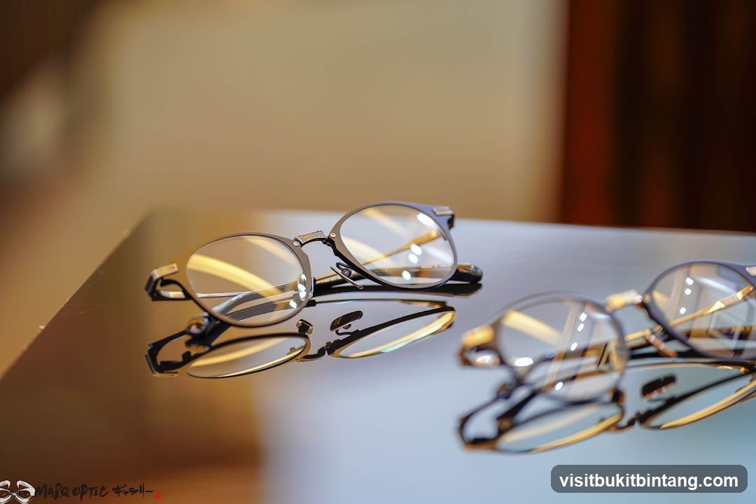 Eyeglasses on a reflective surface