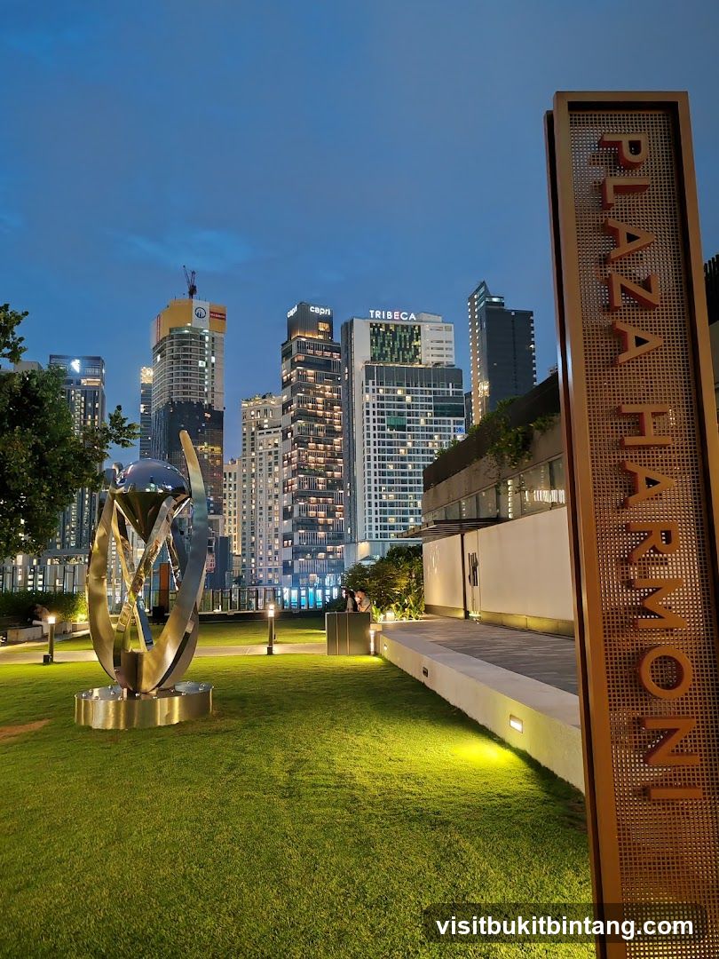 Plaza Harmony Signage with City Skyline