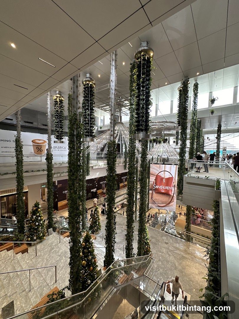 Indoor mall with vertical gardens and Christmas decorations