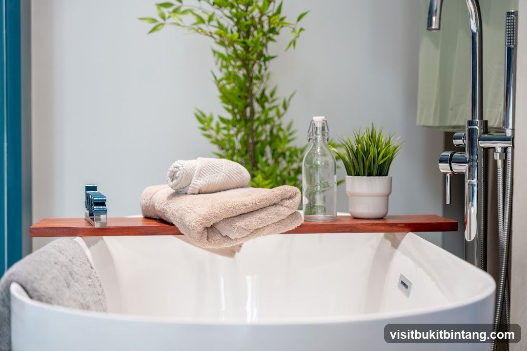 Bathtub with towels and plants