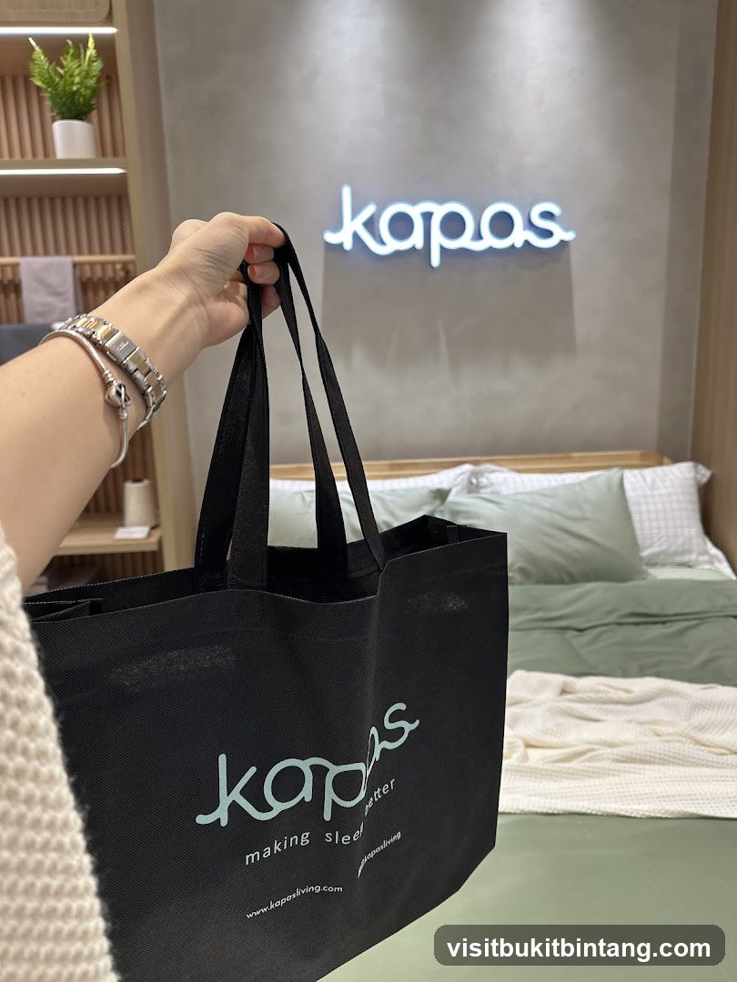 Kapas branded tote bag in a bedroom setting