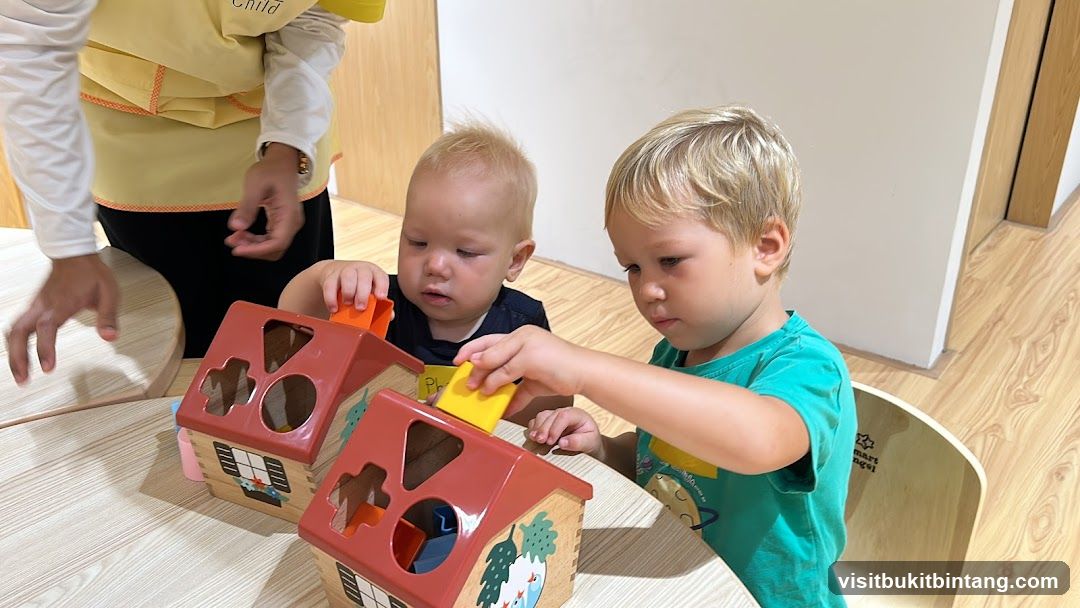 Children Playing with Shape Sorters