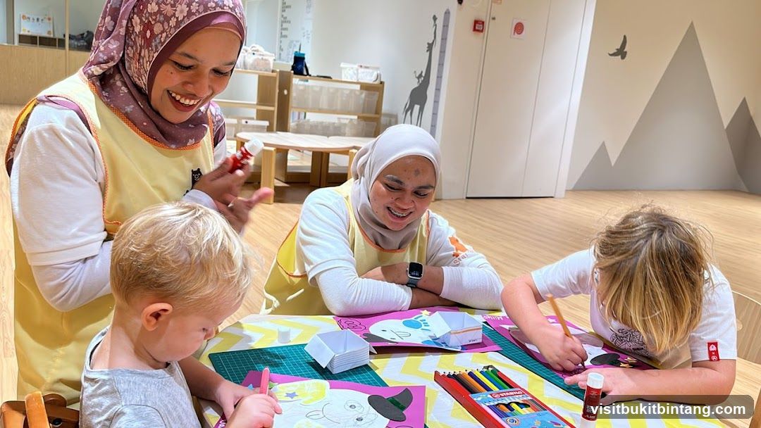 Children and teachers doing arts and crafts