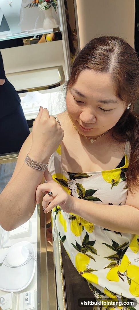 Woman trying on jewelry