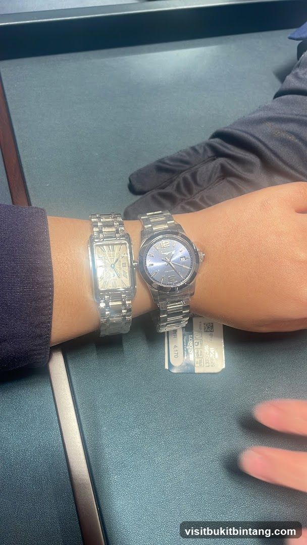 Two watches on a wrist