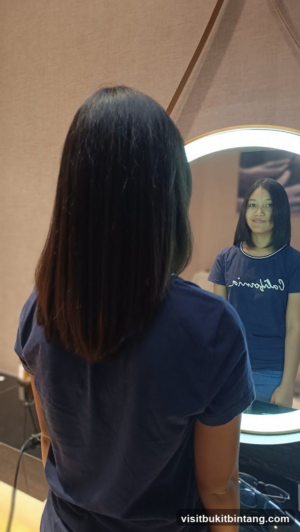 Woman looking in mirror