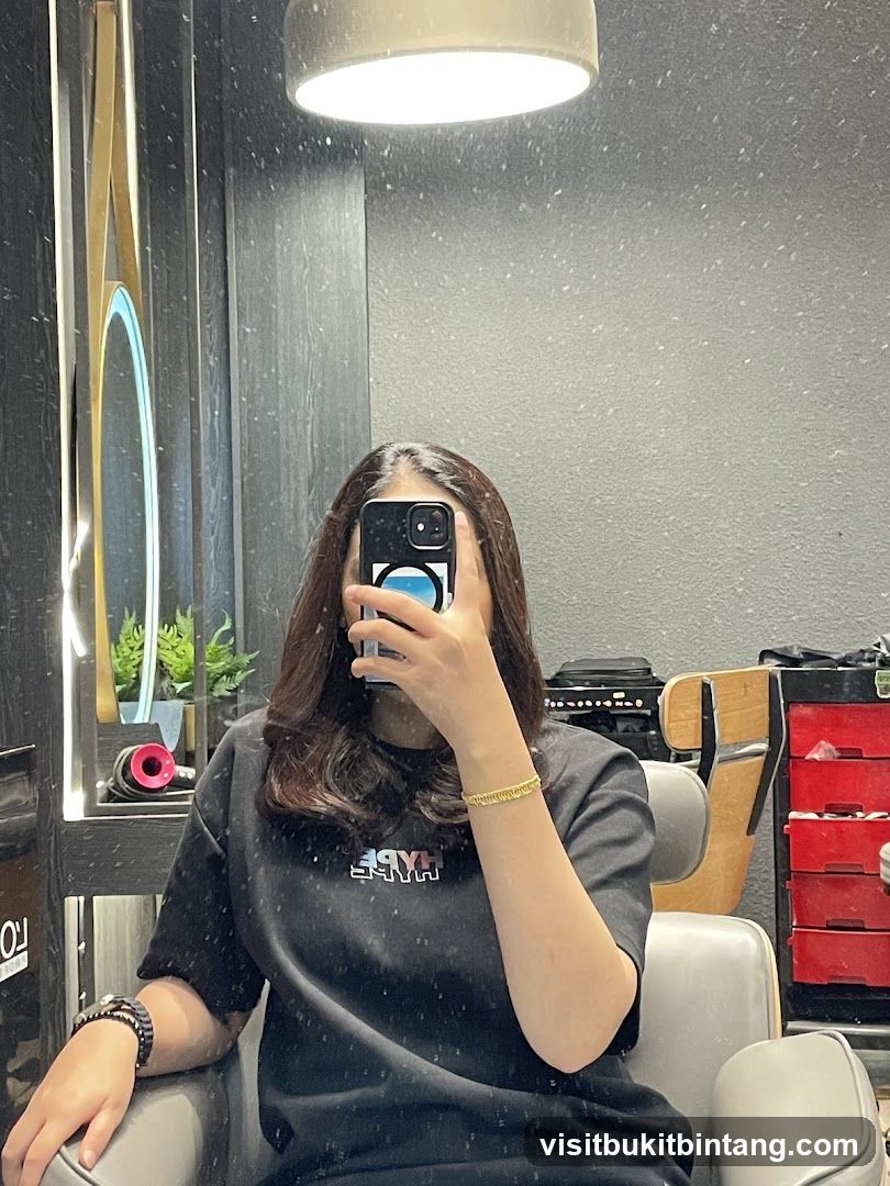 Woman taking a selfie in a salon