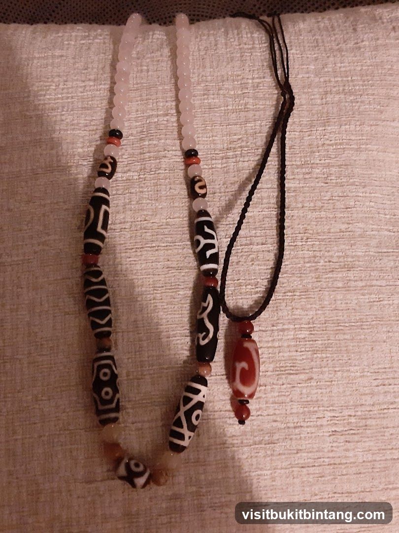 Two necklaces with dzi beads
