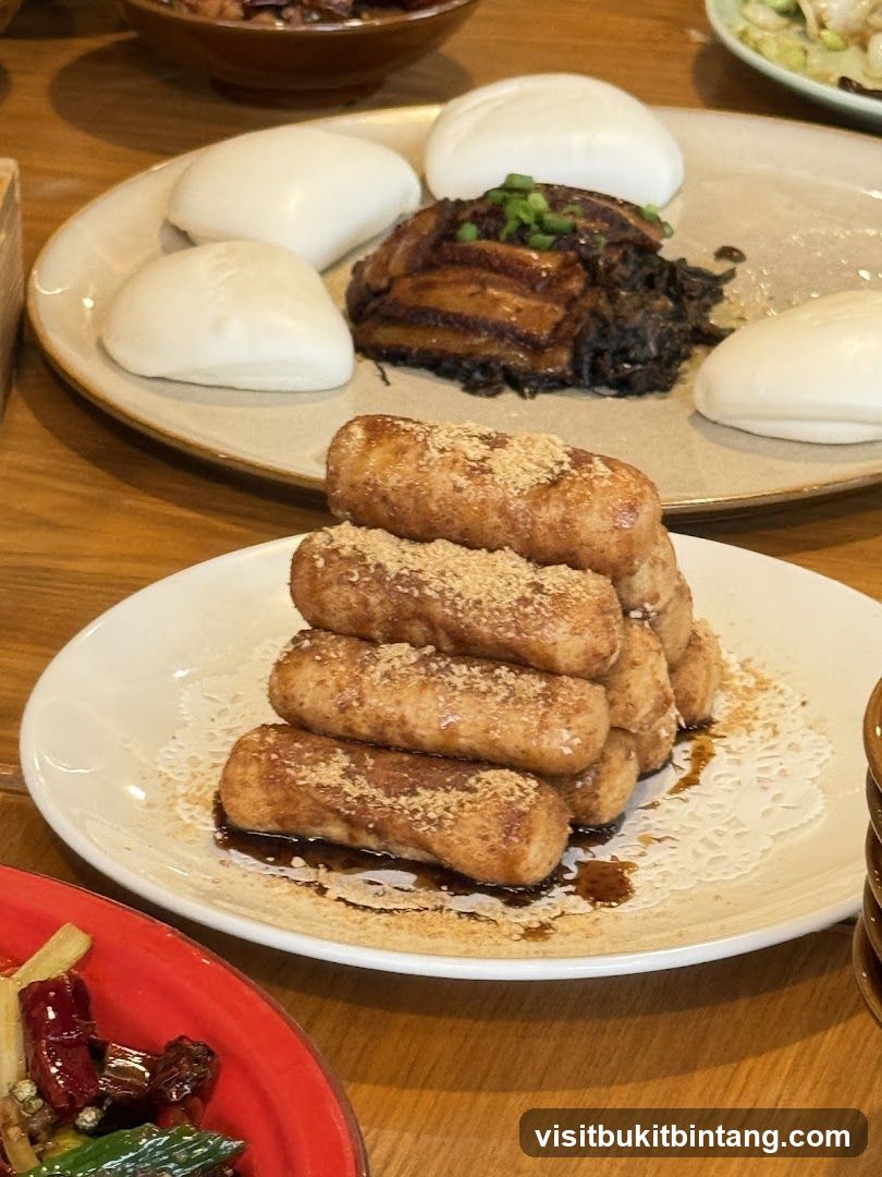 Steamed Buns with Braised Pork and Fried Dough Sticks