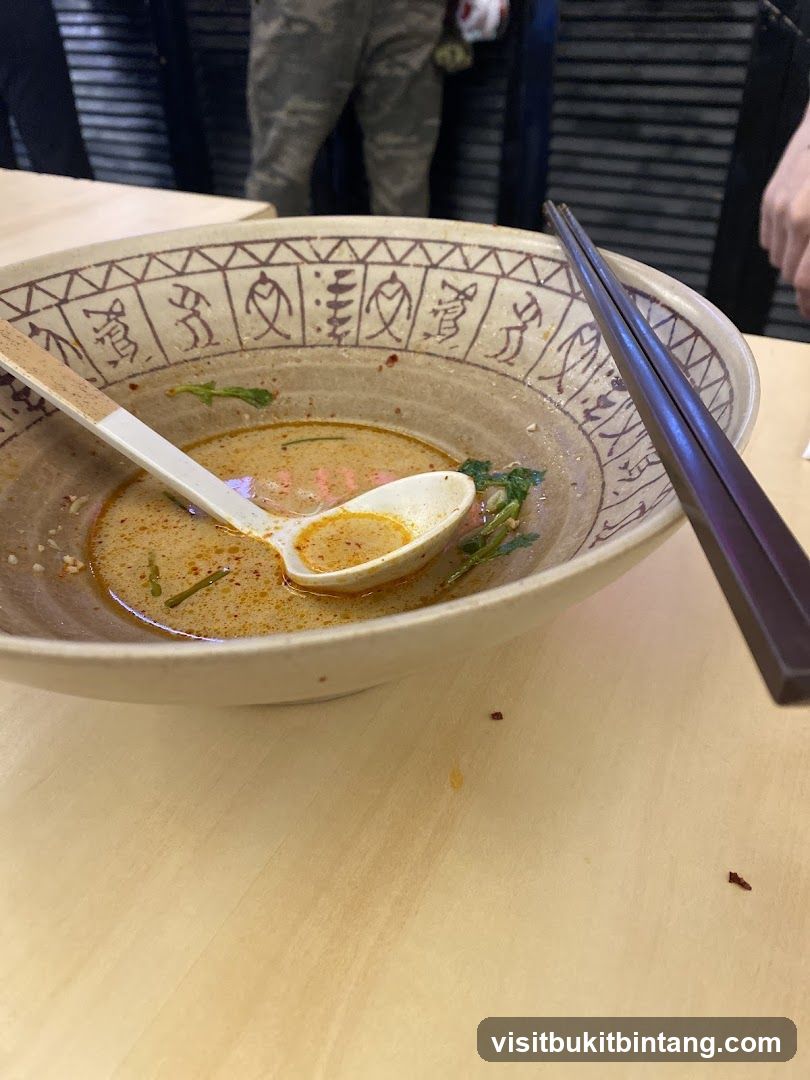 Partially Eaten Bowl of Ramen