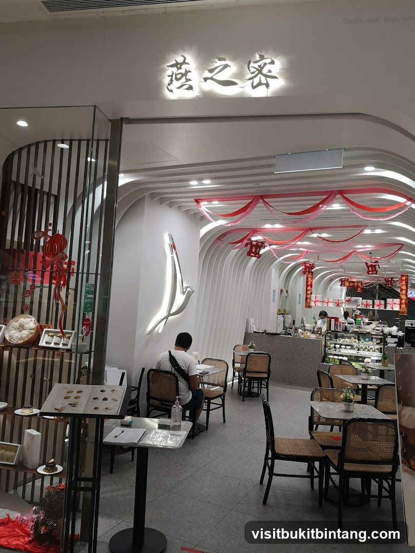 Interior of a cafe with seating and display cases