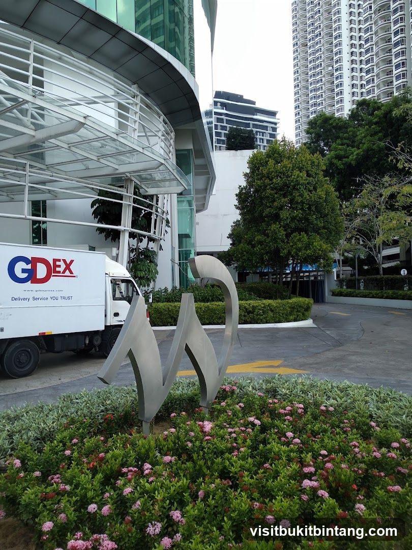 Modern Building Entrance with GDEX Truck