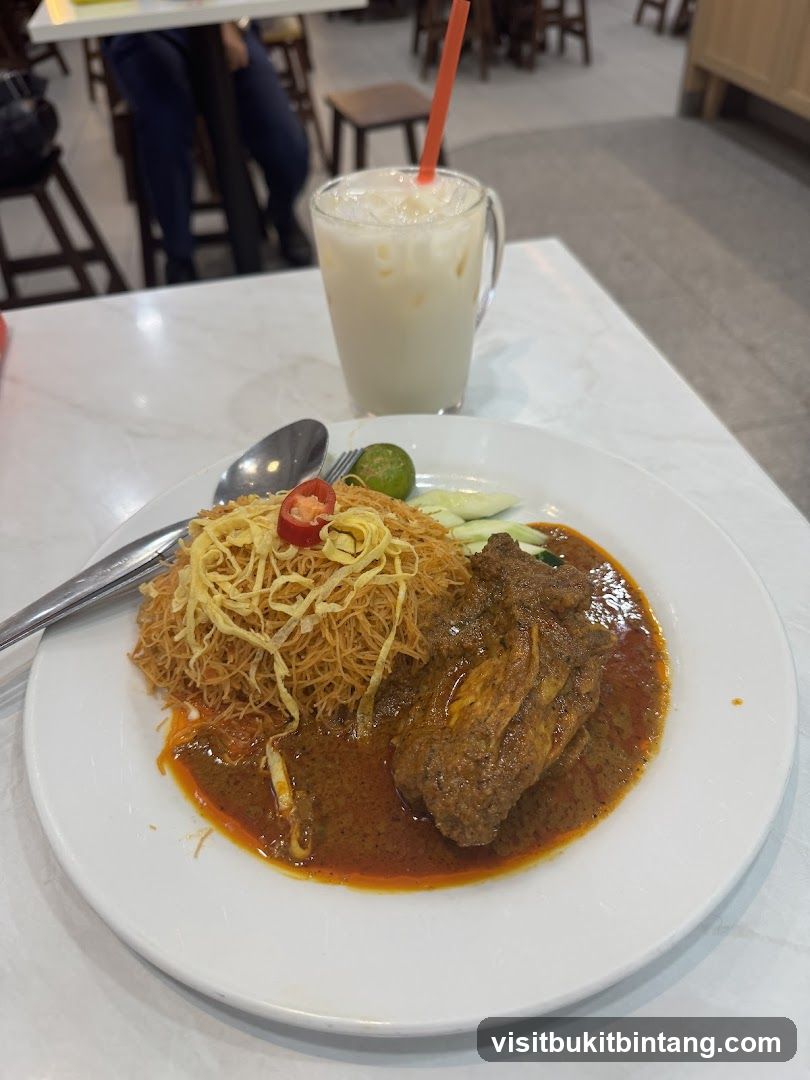 Nasi Lemak with Chicken Rendang