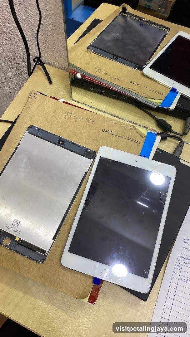 Table with Tablets and Parts