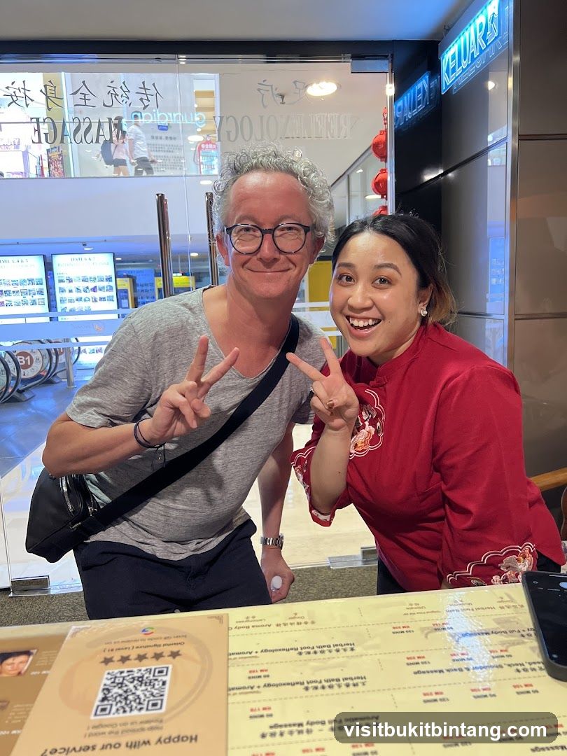 Two People Posing for a Photo in Front of a Massage Establishment