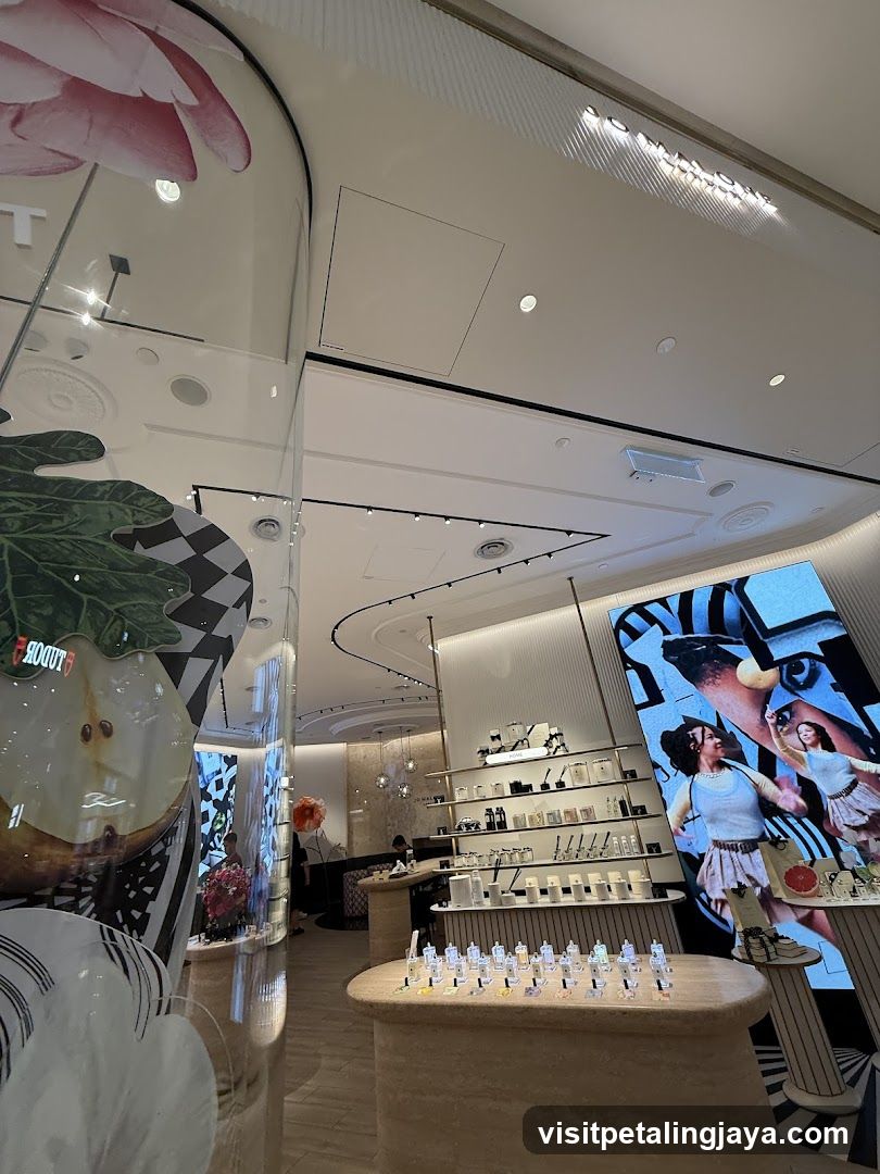 Interior of a modern retail store with product displays and digital screens
