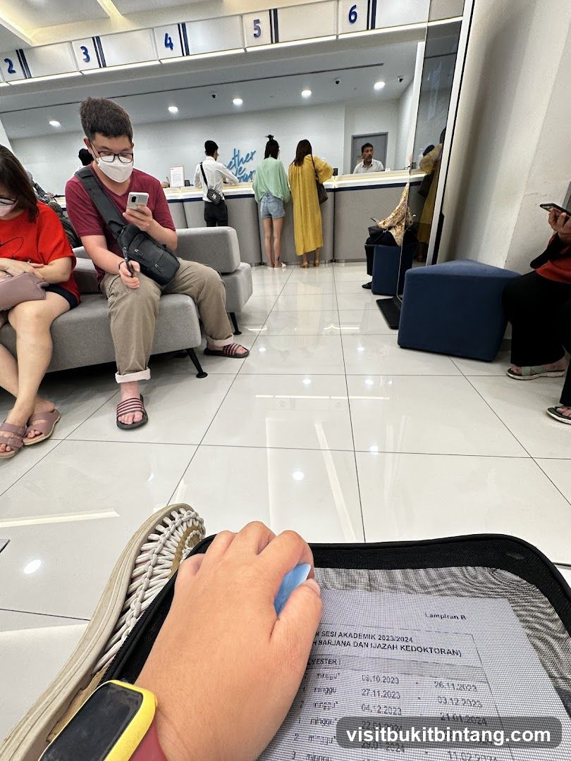 People waiting at a counter