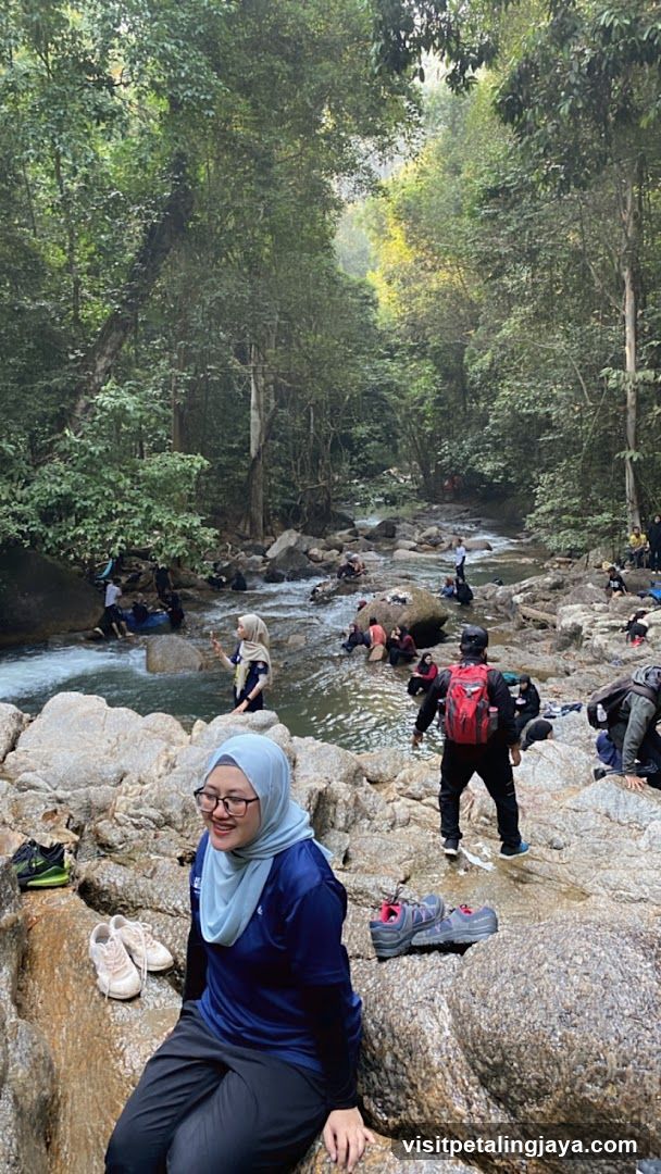 People in a forest stream