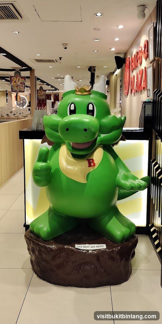Dragon mascot at restaurant entrance