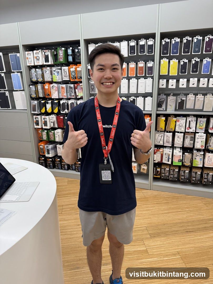 Store employee with phone cases