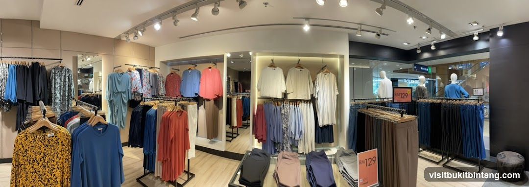 Clothing store interior with apparel on display