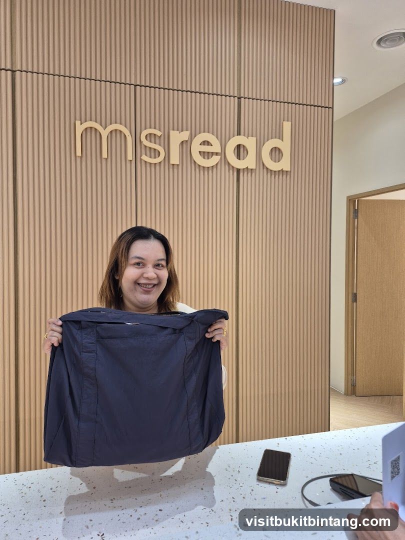 Woman holding a bag in front of a store sign