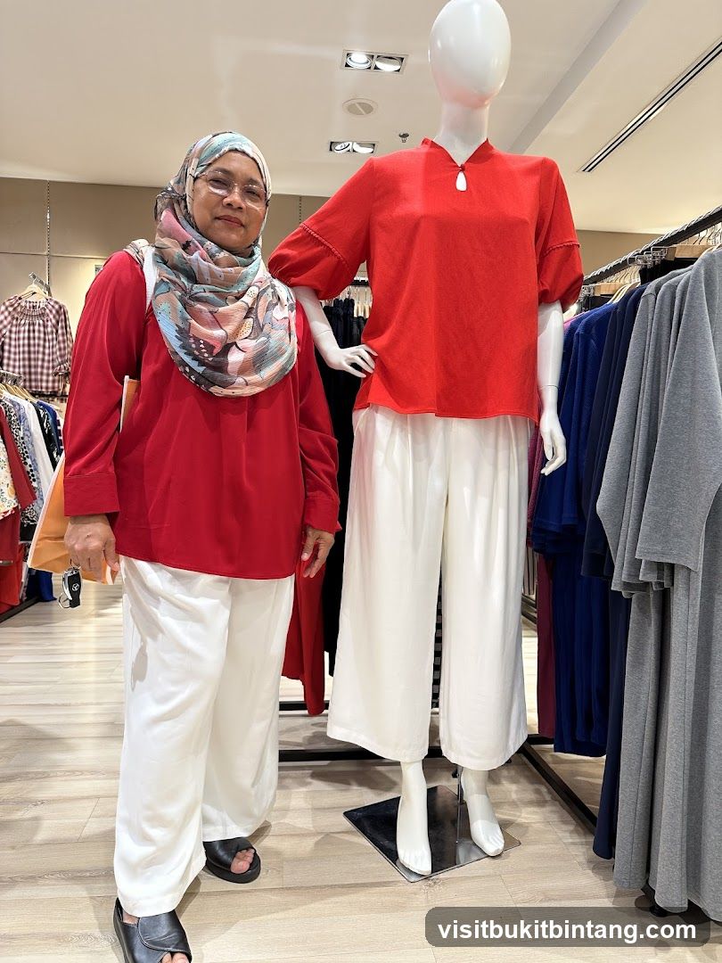 Woman Poses Next to Mannequin in Clothing Store