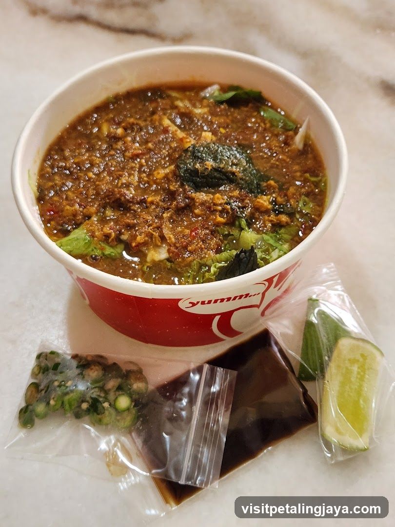 Bowl of Spicy Noodle Soup with Condiments
