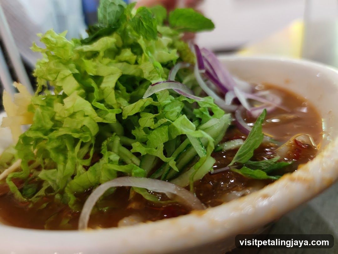 Bowl of Noodle Soup with Fresh Vegetables