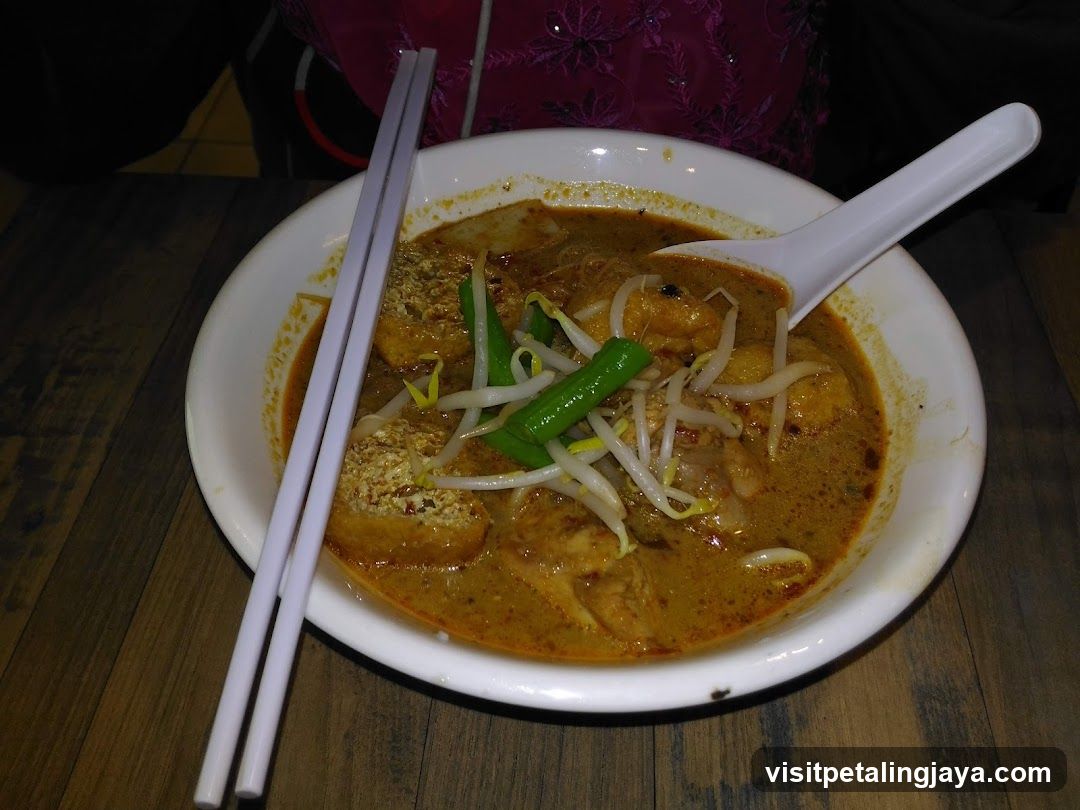Bowl of Curry with Bean Sprouts and Green Chili