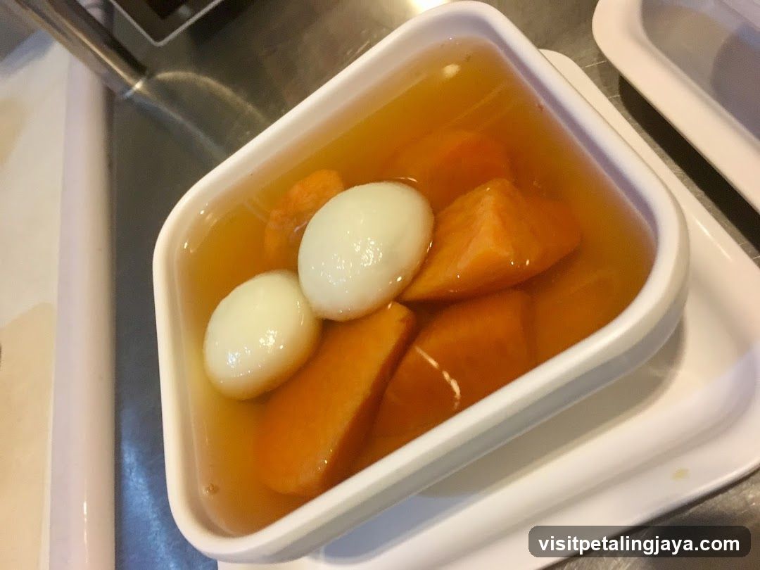 Sweet Soup with Glutinous Rice Balls and Sweet Potato