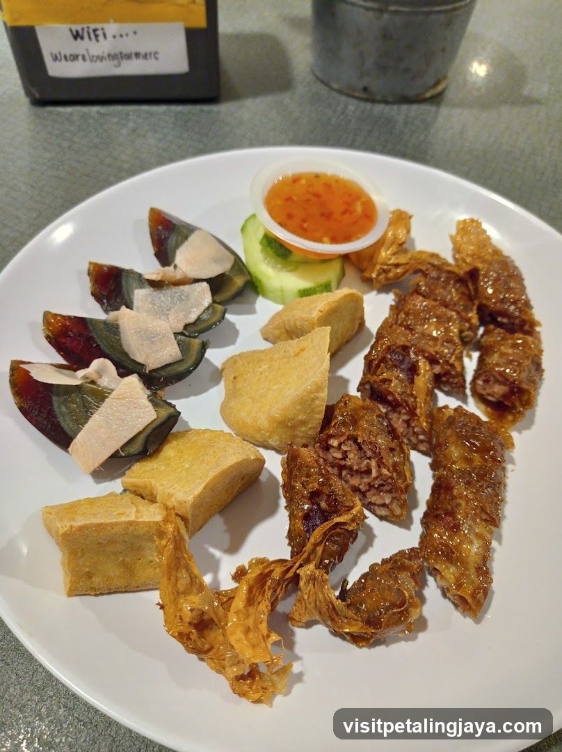 Assorted Fried Snacks and Pickled Eggs with Chili Sauce
