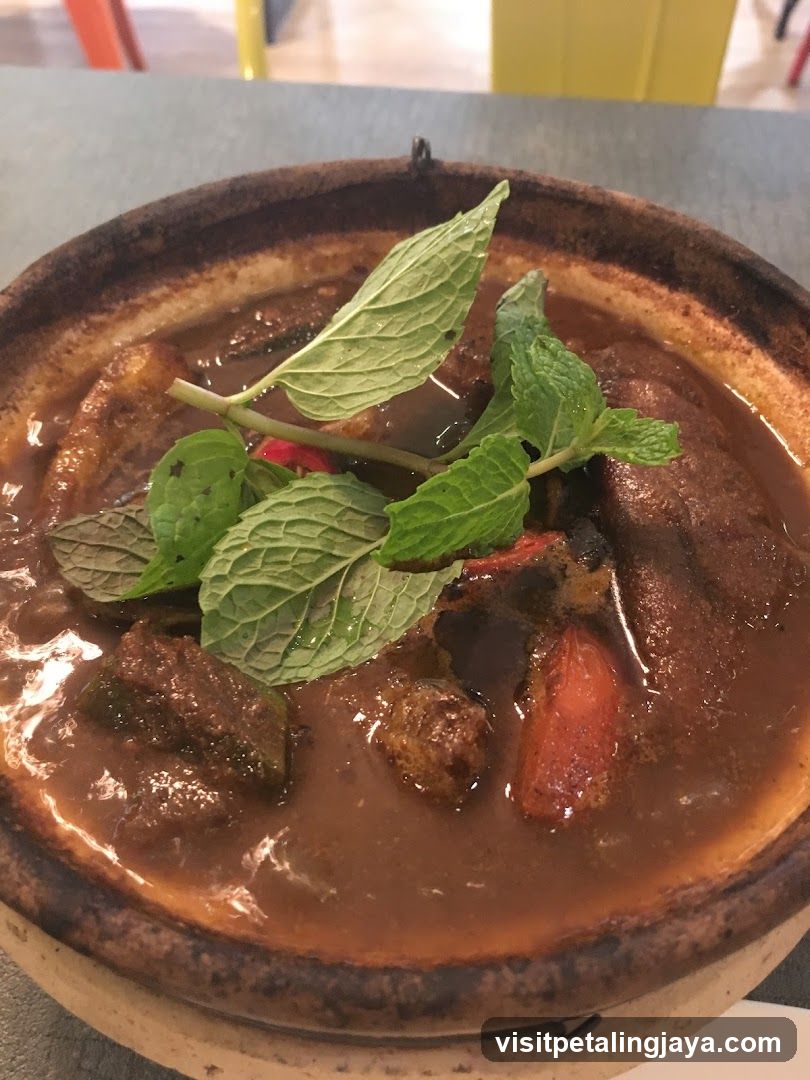 Casseroled Dish with Mint Garnish