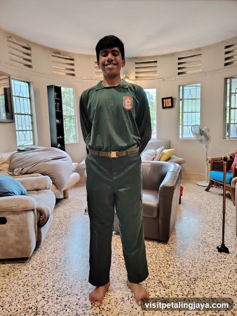 Young man in uniform indoors
