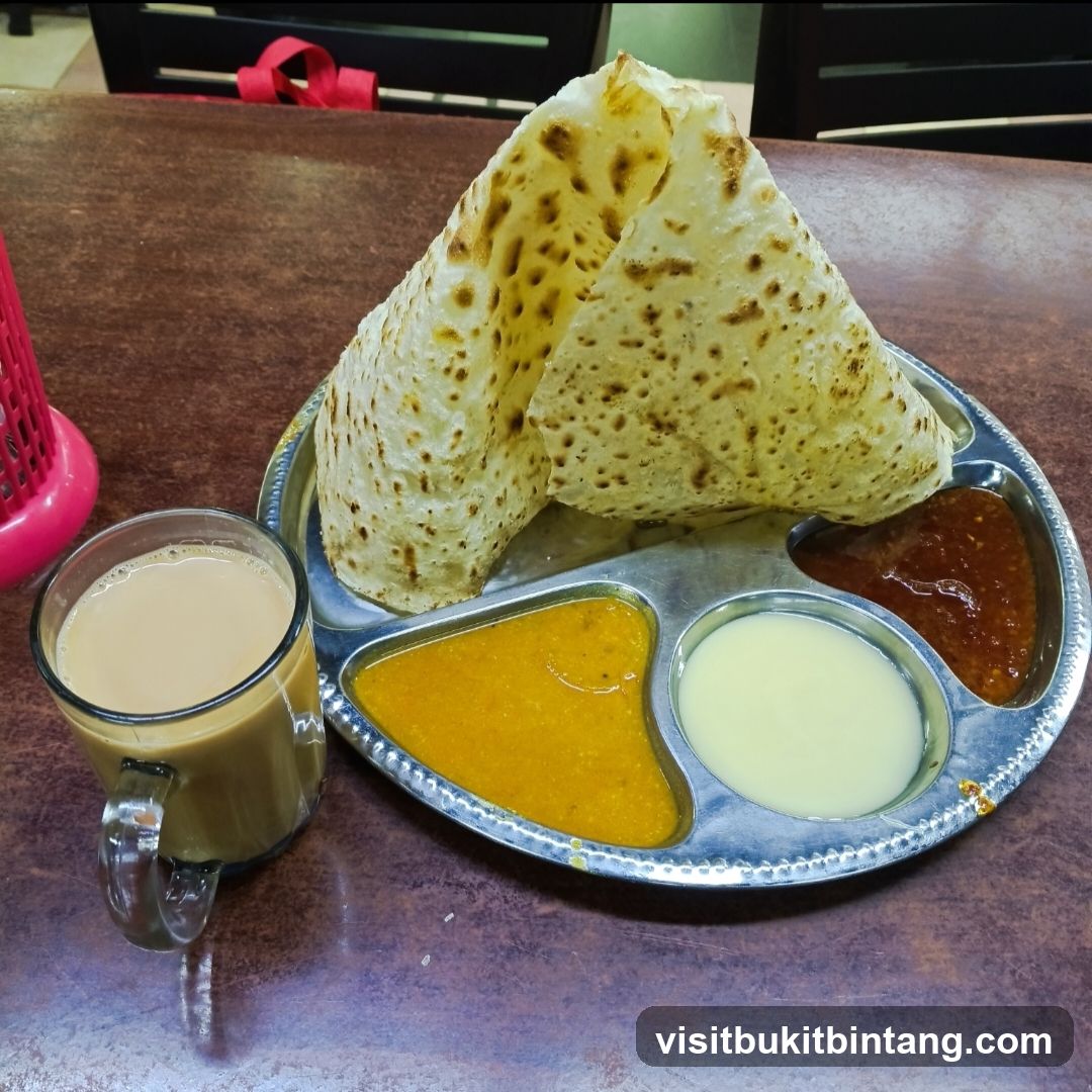 Roti Canai with Curry and Teh Tarik