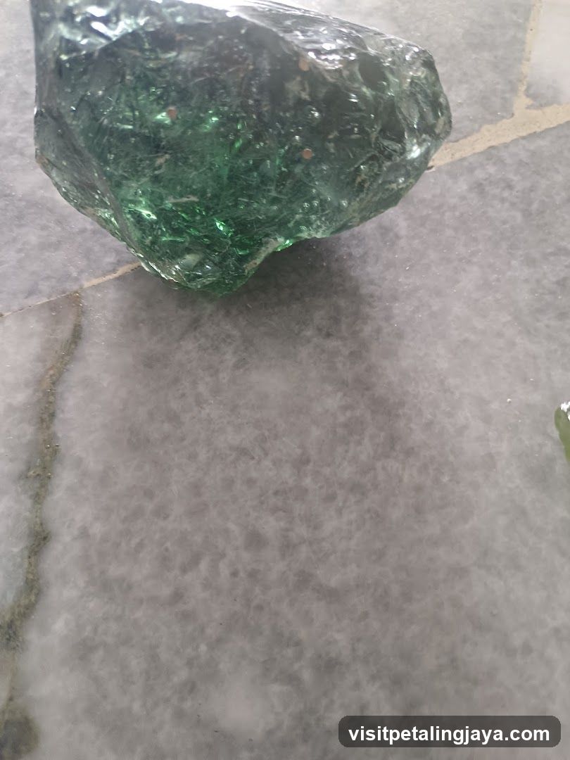 Green Glass Rock on Floor