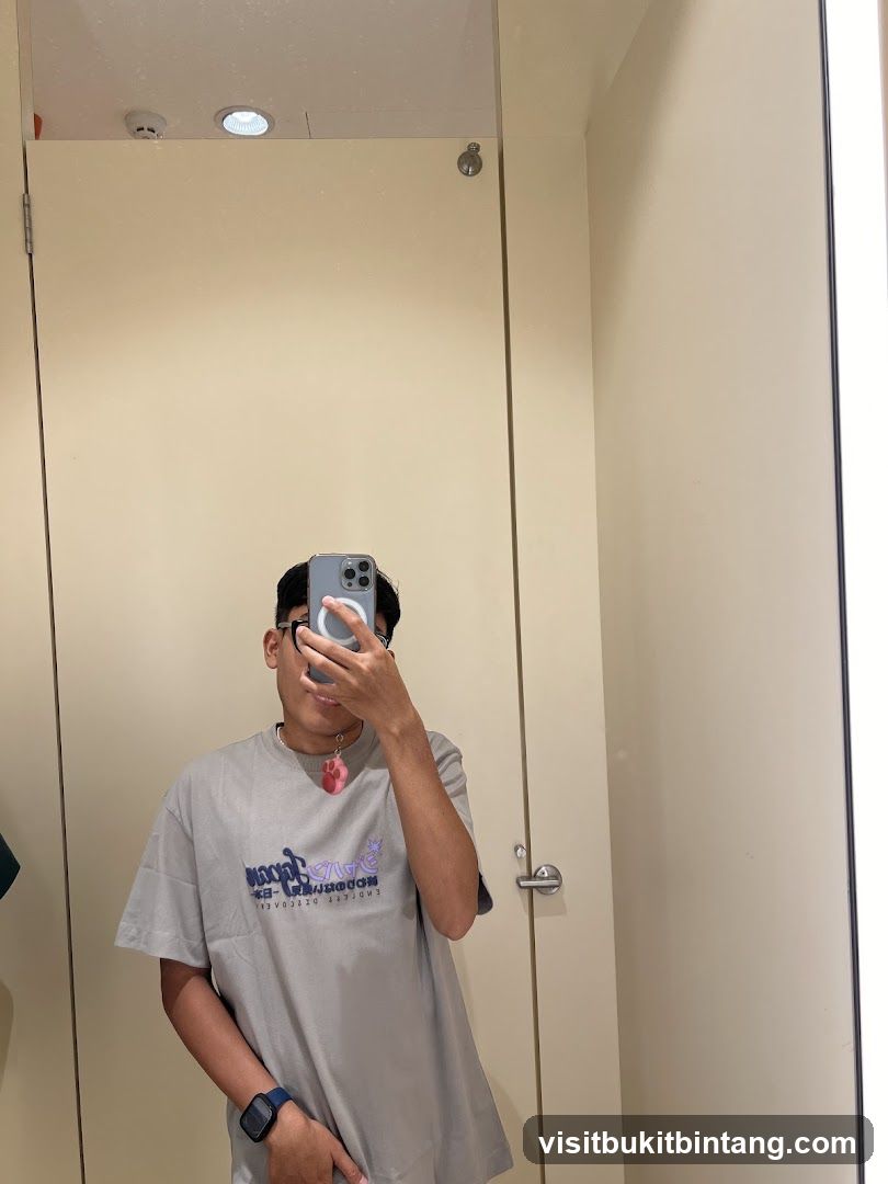 Person in a T-shirt in a Fitting Room