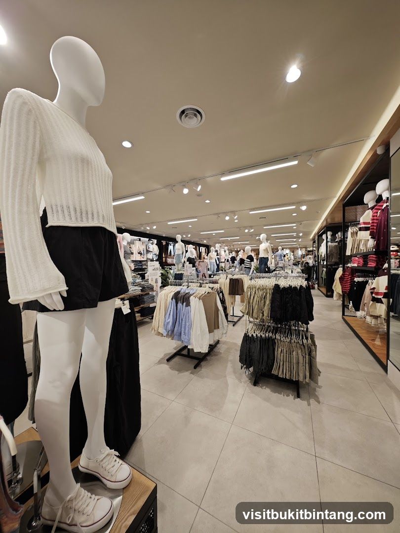 Clothing store interior with mannequins and apparel displays