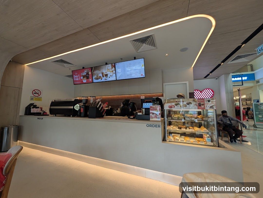Cafe Counter with Pastries and Drinks