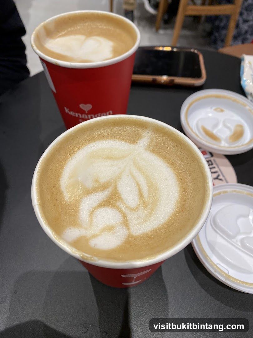 Two coffees with latte art