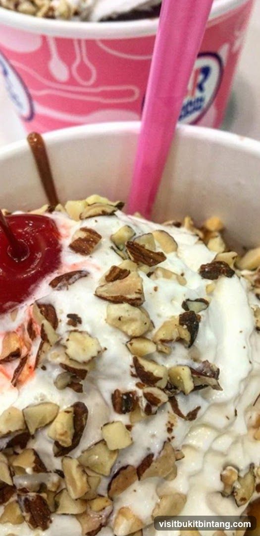 Ice Cream Sundae with Cherry and Almonds