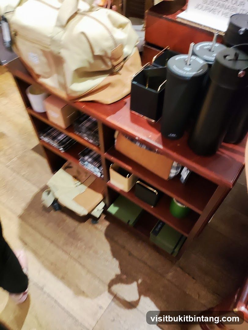 Display shelves with bags and tumblers