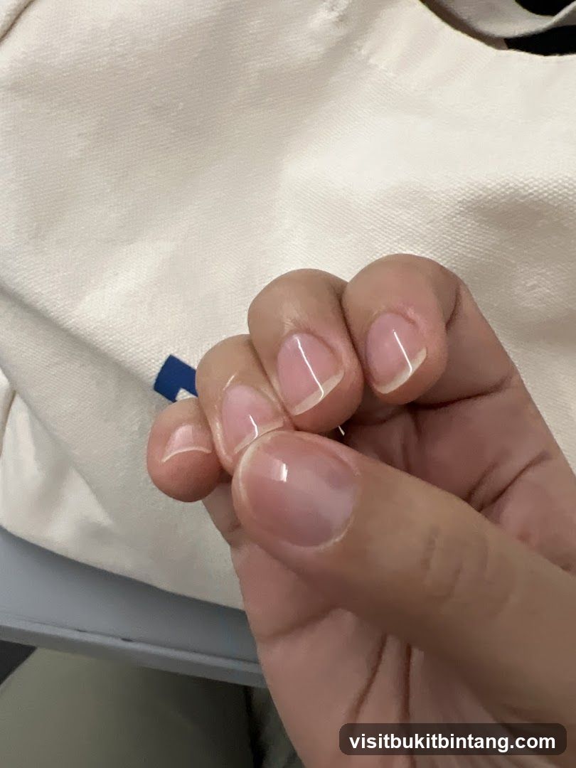 Hand with manicured nails